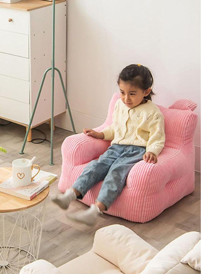 Kids Bean Bag Chair pink show with a kid sitting on it